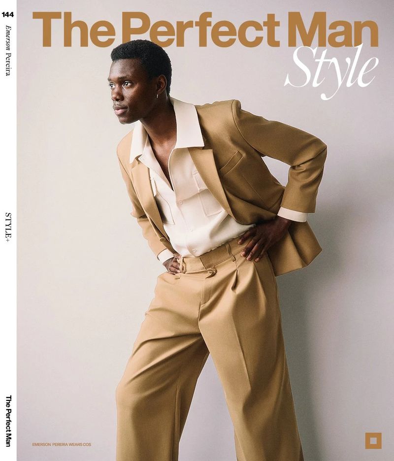 Magazine cover featuring Black male model wearing a tan suit and unbuttoned shirt in a studio with text overlay.