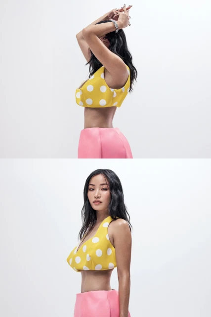 Two views of an Asian woman in a polka dot crop top and pink skirt against a bright background, fashion-forward and stylish.