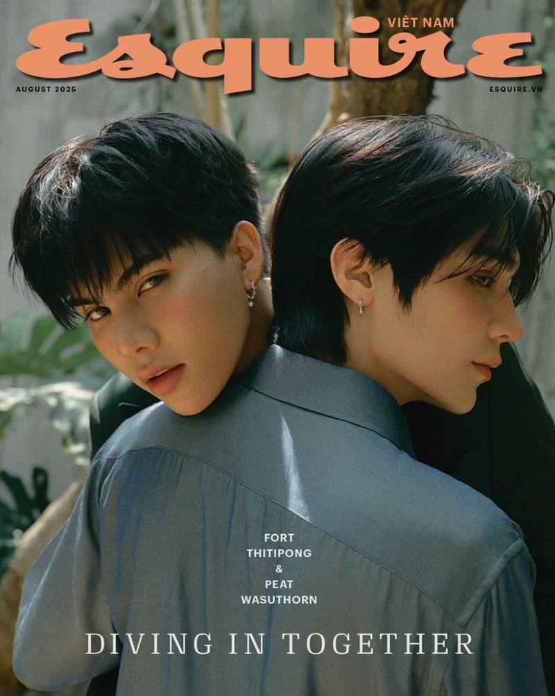 Esquire Vietnam cover featuring two young adult males with dark hair and light skin in a medium shot with lush green foliage backdrop.