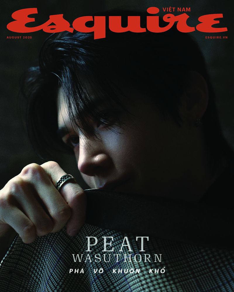 Esquire Vietnam August 2025 cover featuring Peat Wasuthorn in a patterned coat and ring under dramatic low-key lighting.
