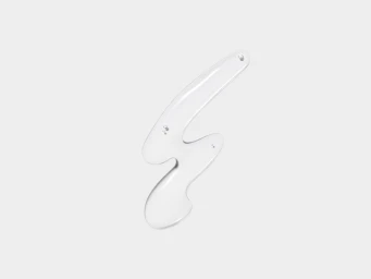 Clear liquid skincare product swatch with small bubbles against a neutral white background