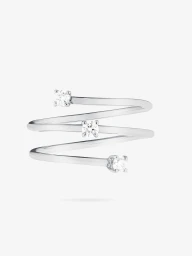 Silver spiral ring with three diamond accents against a plain white background by Slate Studios for Lana Jewelry.