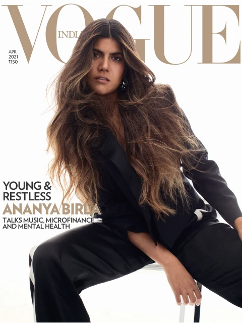 Vogue India cover featuring Ananya Birla in a black blazer and pants against a white backdrop. Magazine cover with large Vogue logo.