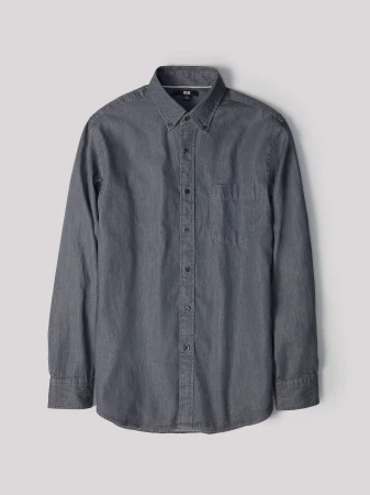 Studio shot of a gray, long-sleeved button-down shirt with a pocket. The casual shirt is collared and made of soft cotton.