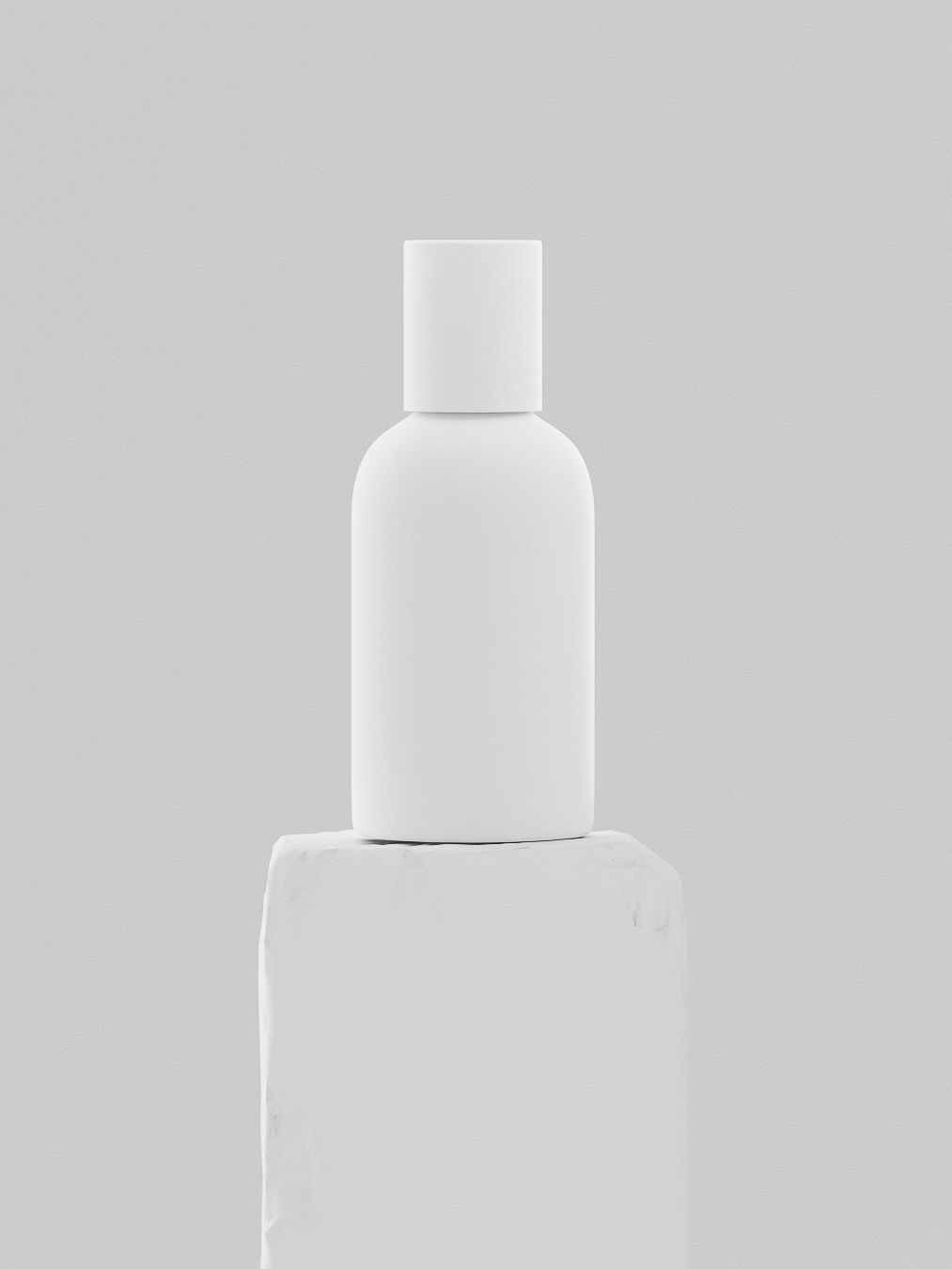 Minimalist white bottle sits atop a rough white block against a soft white background, creating a clean, modern aesthetic.