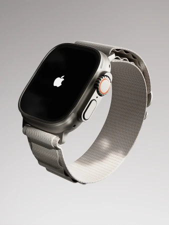 Close-up of an Apple Watch Ultra with a gray band, showcasing its design and technology in a studio product shot.