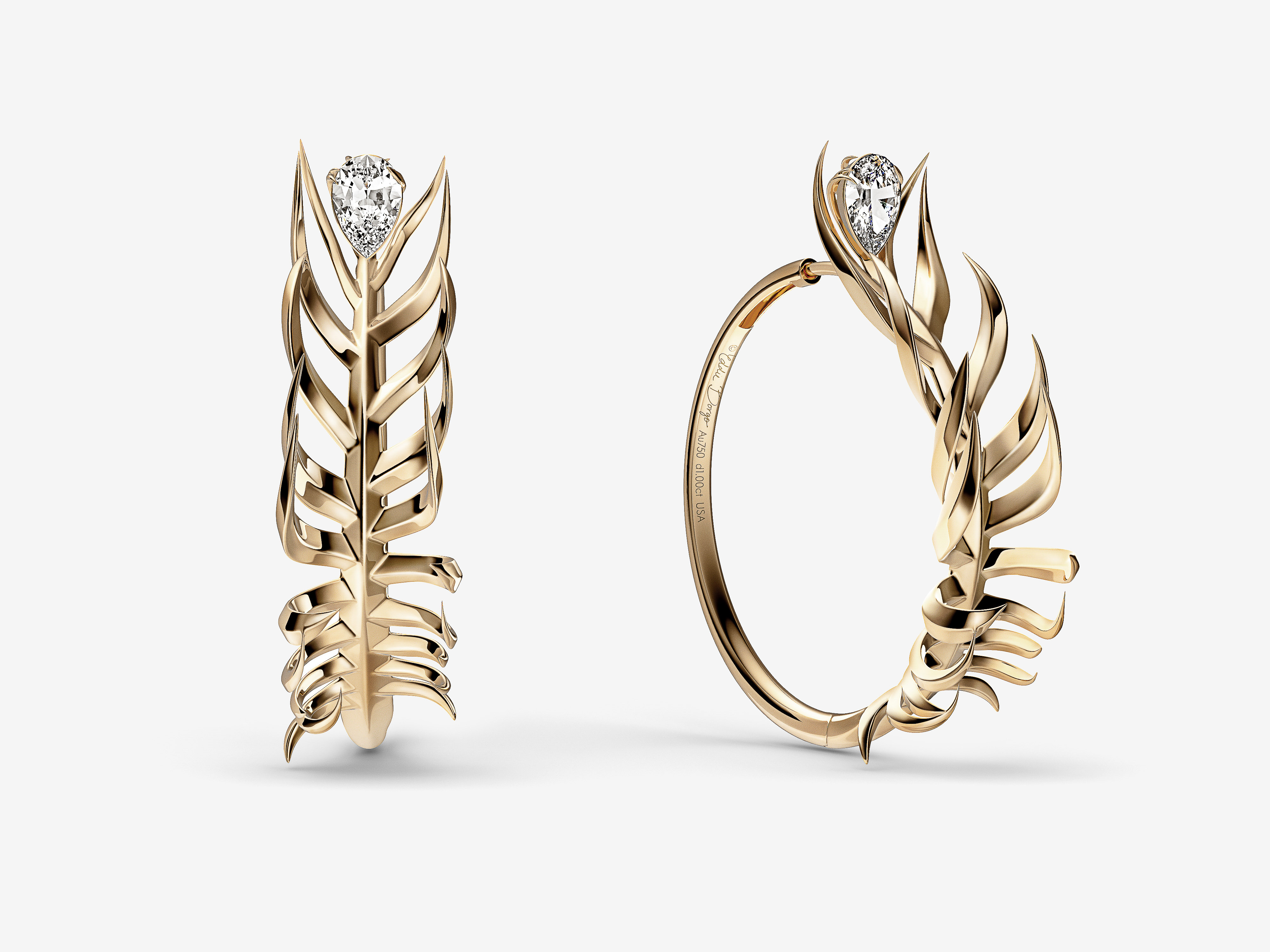 A pair of sculptural gold hoop earrings featuring a leaf-like design and set with a small diamond, showcased against a white backdrop.