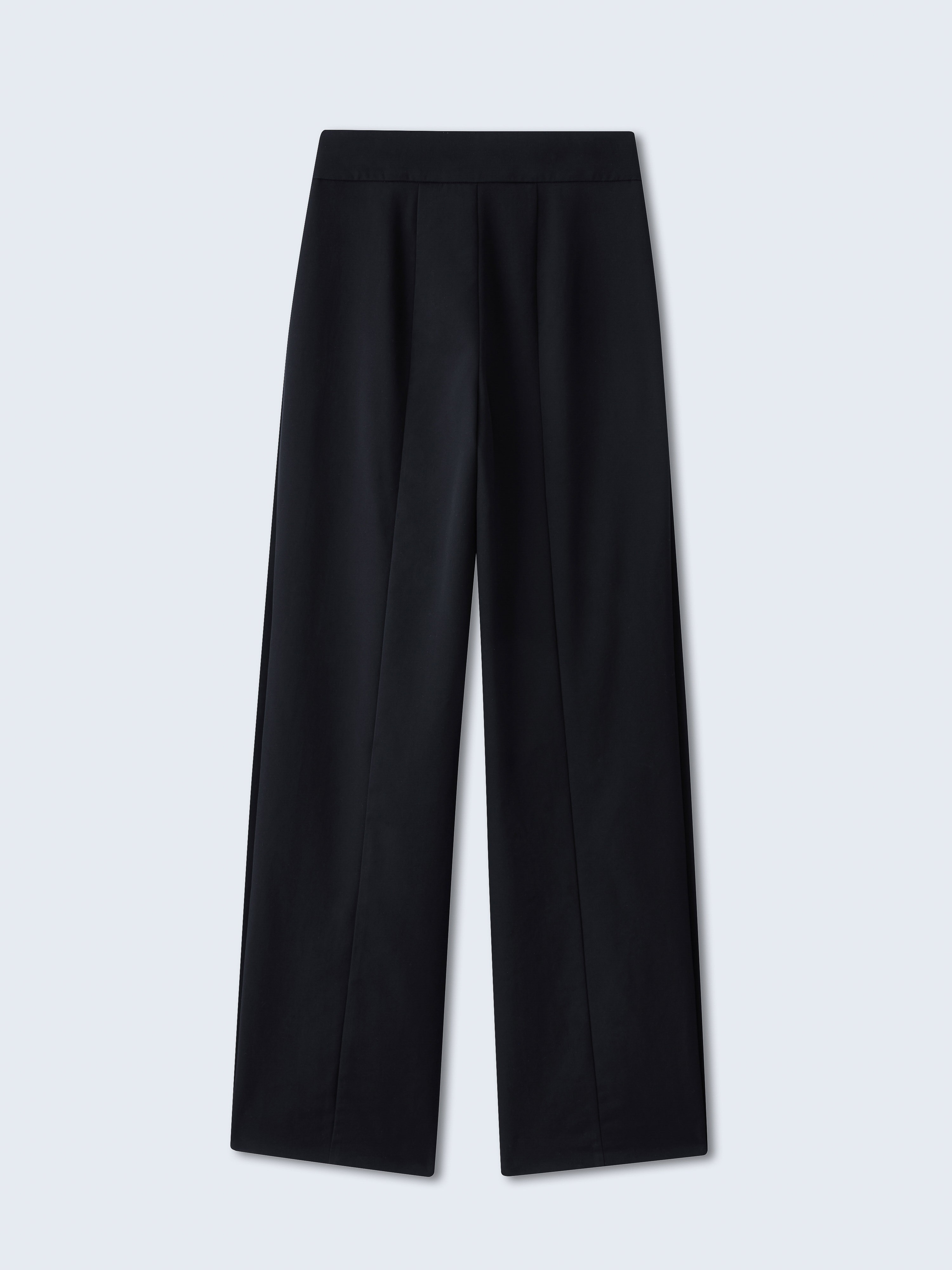 Studio shot of black wide-leg dress pants with a high waist and tailored detailing against a light gray background.