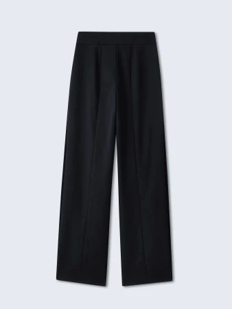Studio shot of black wide-leg dress pants with a high waist and tailored detailing against a light gray background.
