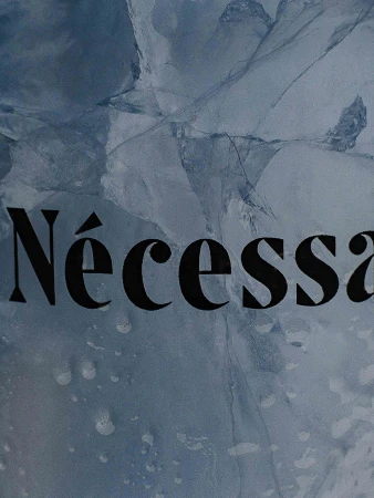 Abstract background image with a cracked ice texture and the word 'Nécessaire' in bold, sans-serif font overlayed on top.
