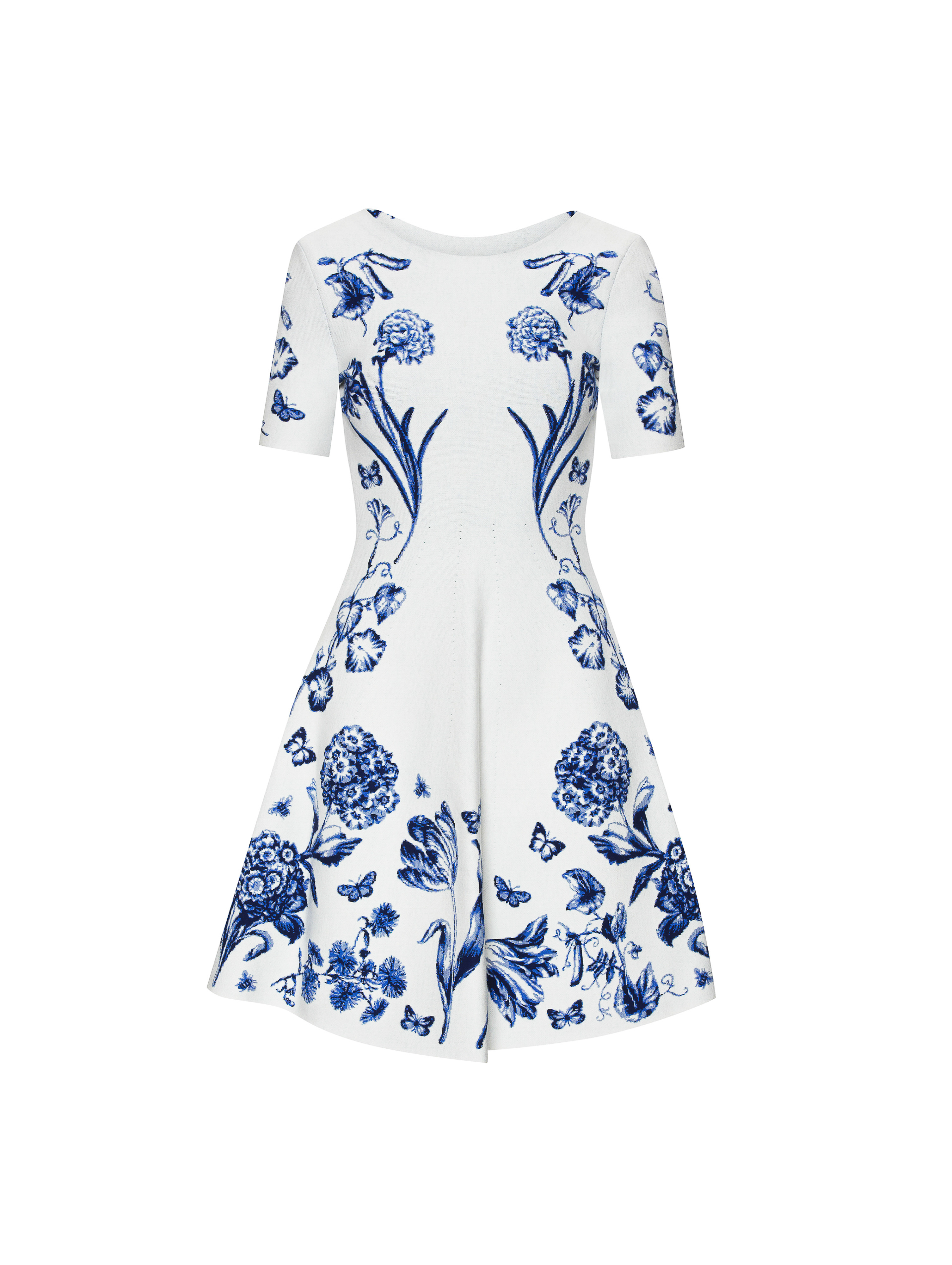White short-sleeved dress with blue floral and butterfly pattern on a white background, fashion photography.