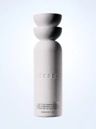 Cécred Clarifying Shampoo & Scalp Scrub bottle with textured off-white finish and stacked cap against a white background.