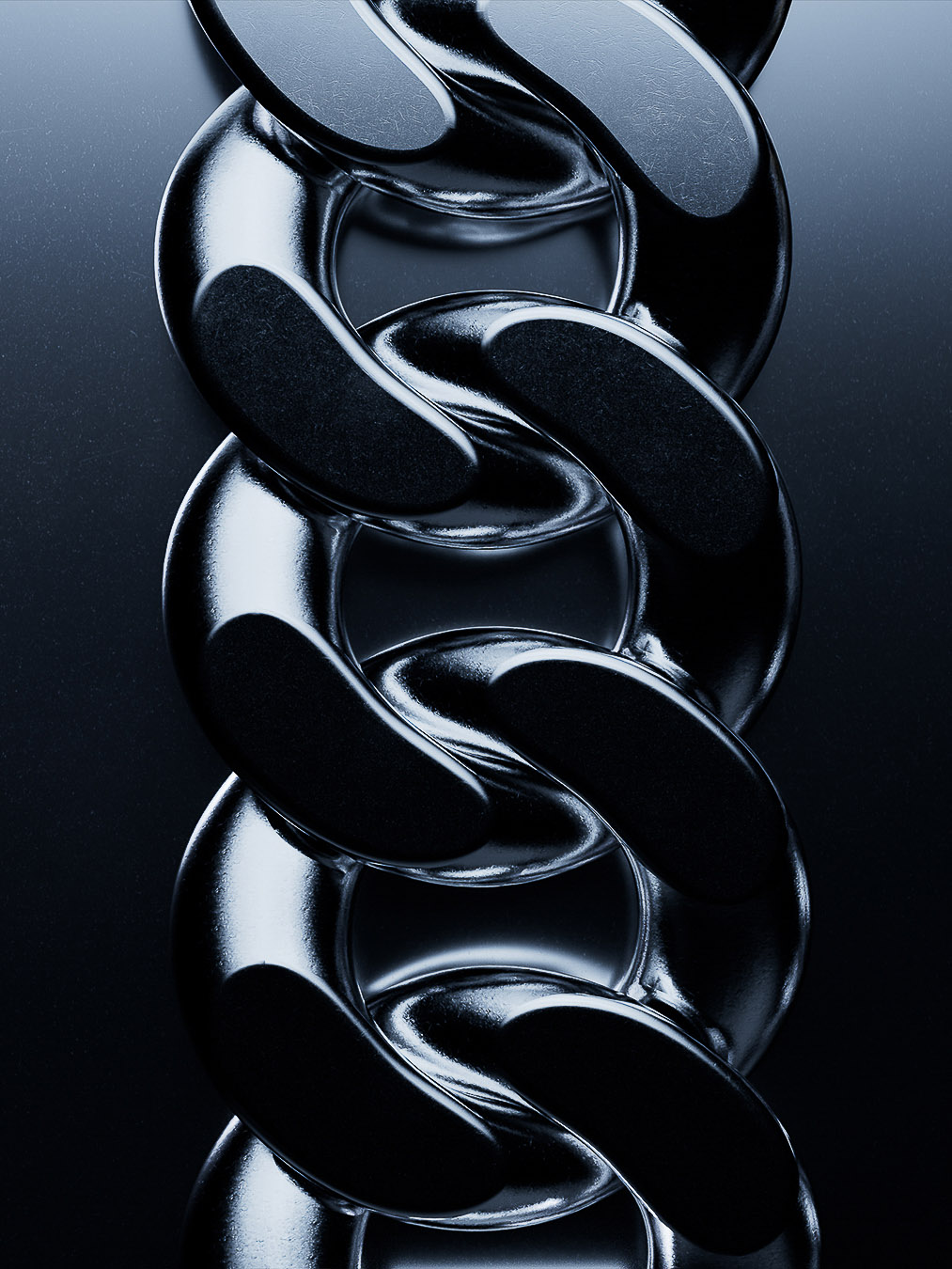 Close-up of a thick, silver chain with multiple links, reflecting light against a dark gray background; showcasing the chain's texture and design.