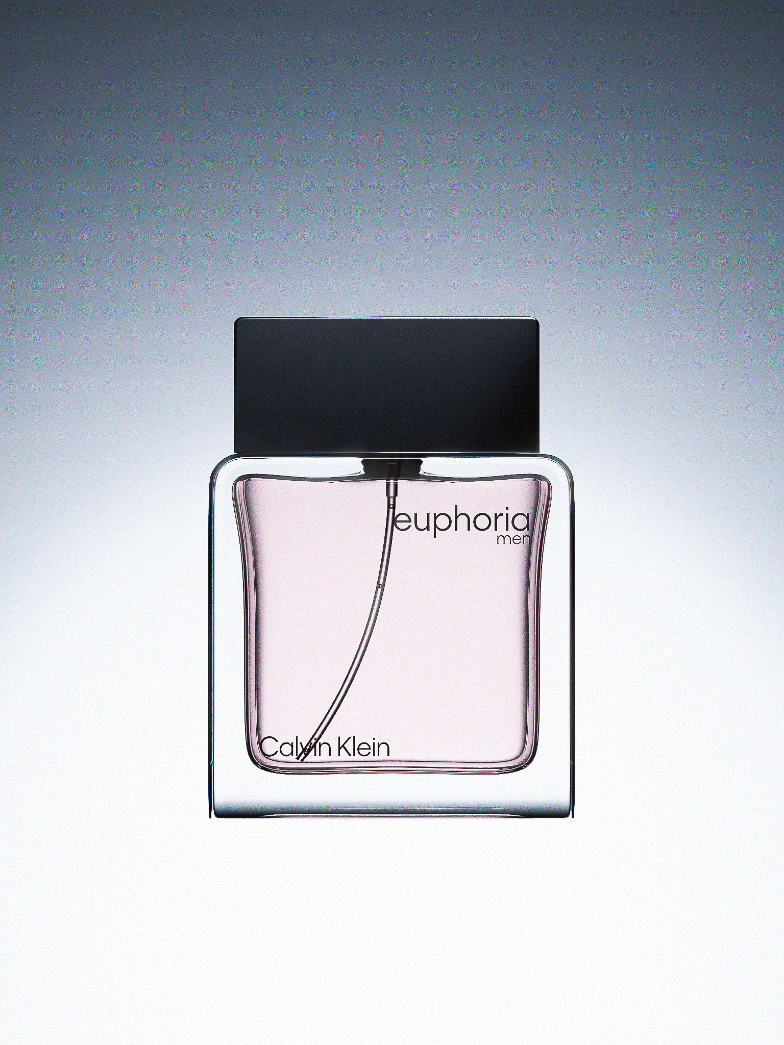 Close-up studio shot of a Calvin Klein Euphoria Men's fragrance bottle on a white background, showcasing the product's design.