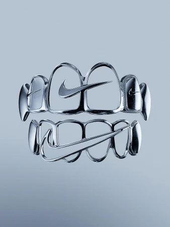 Chrome teeth grills with a Nike logo design; creative dental fashion accessory with silver metallic texture against a grey gradient background.