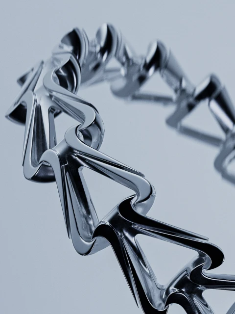 Abstract close-up of an interconnected chain link structure made of reflective metal on a gradient blue background with geometric design.