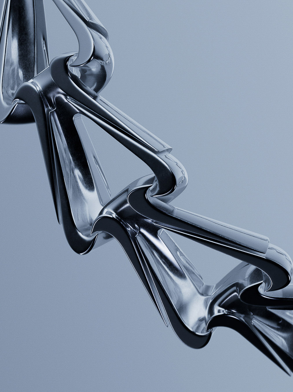 Abstract chrome object on soft blue background. Sleek, reflective, and modern, this abstract sculpture creates an eye-catching form.