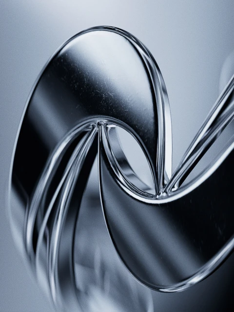 Abstract macro photograph of reflective, curved metal ribbons on a soft gray background with studio lighting.