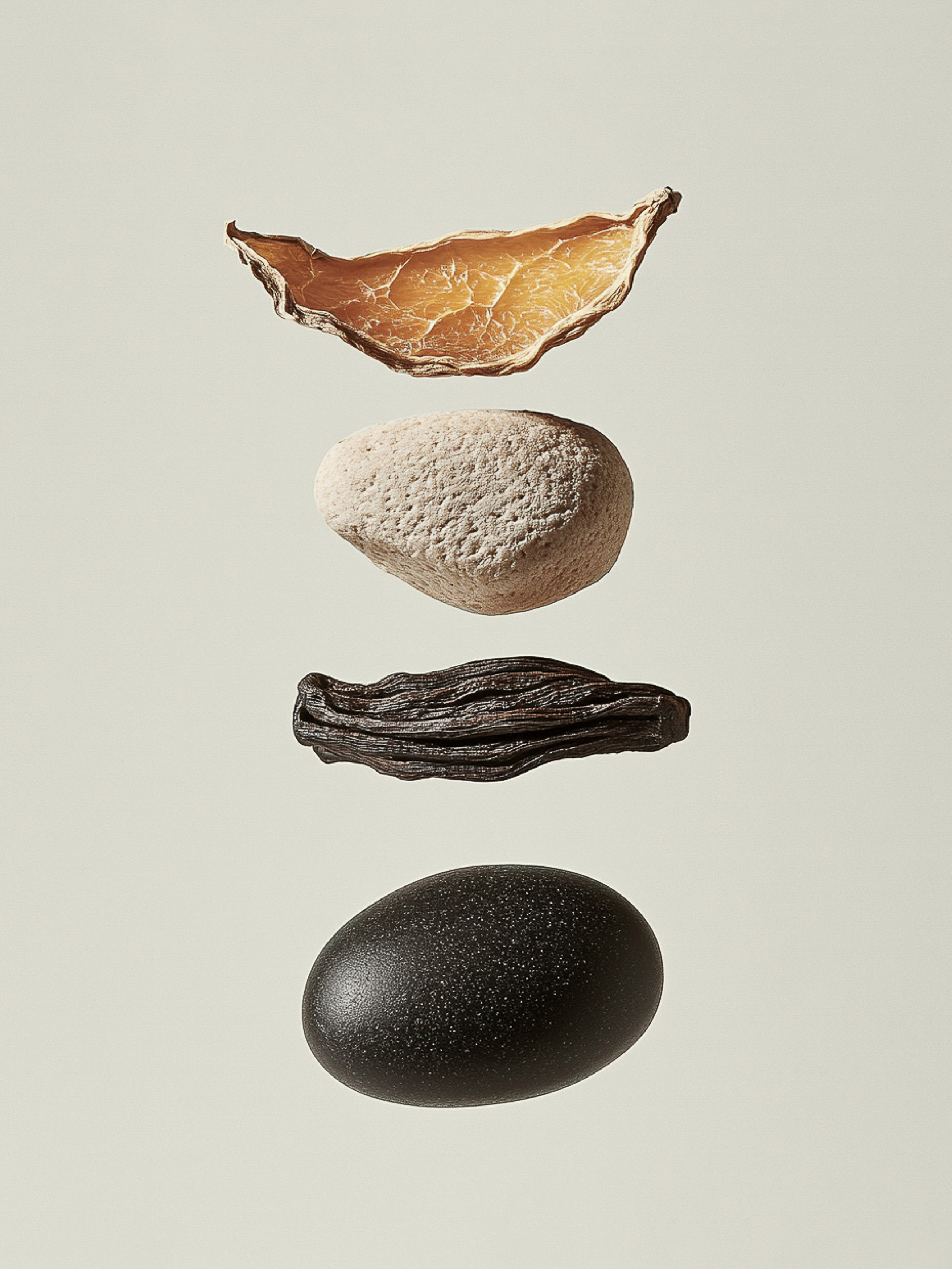 Studio shot of four textured objects stacked vertically, featuring organic shapes and neutral tones against a light background.