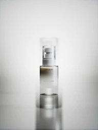 A translucent pump bottle of Bang Bang skincare product centered on a soft grey gradient studio backdrop with motion blur reflection.