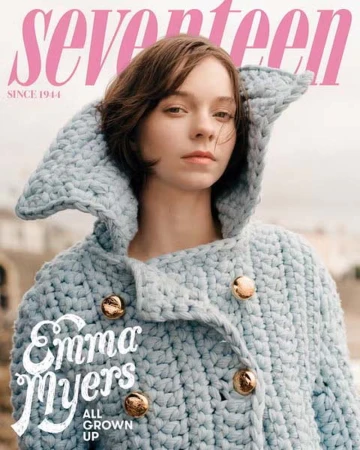 Magazine cover featuring Emma Myers wearing a light blue knitted hooded jacket with gold buttons, against a blurred outdoor background.