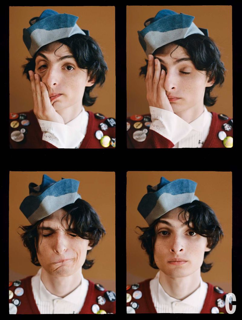 Four-panel studio portrait of a young adult with dark curly hair wearing a blue newsboy cap and smiling slightly in a maroon sweater.