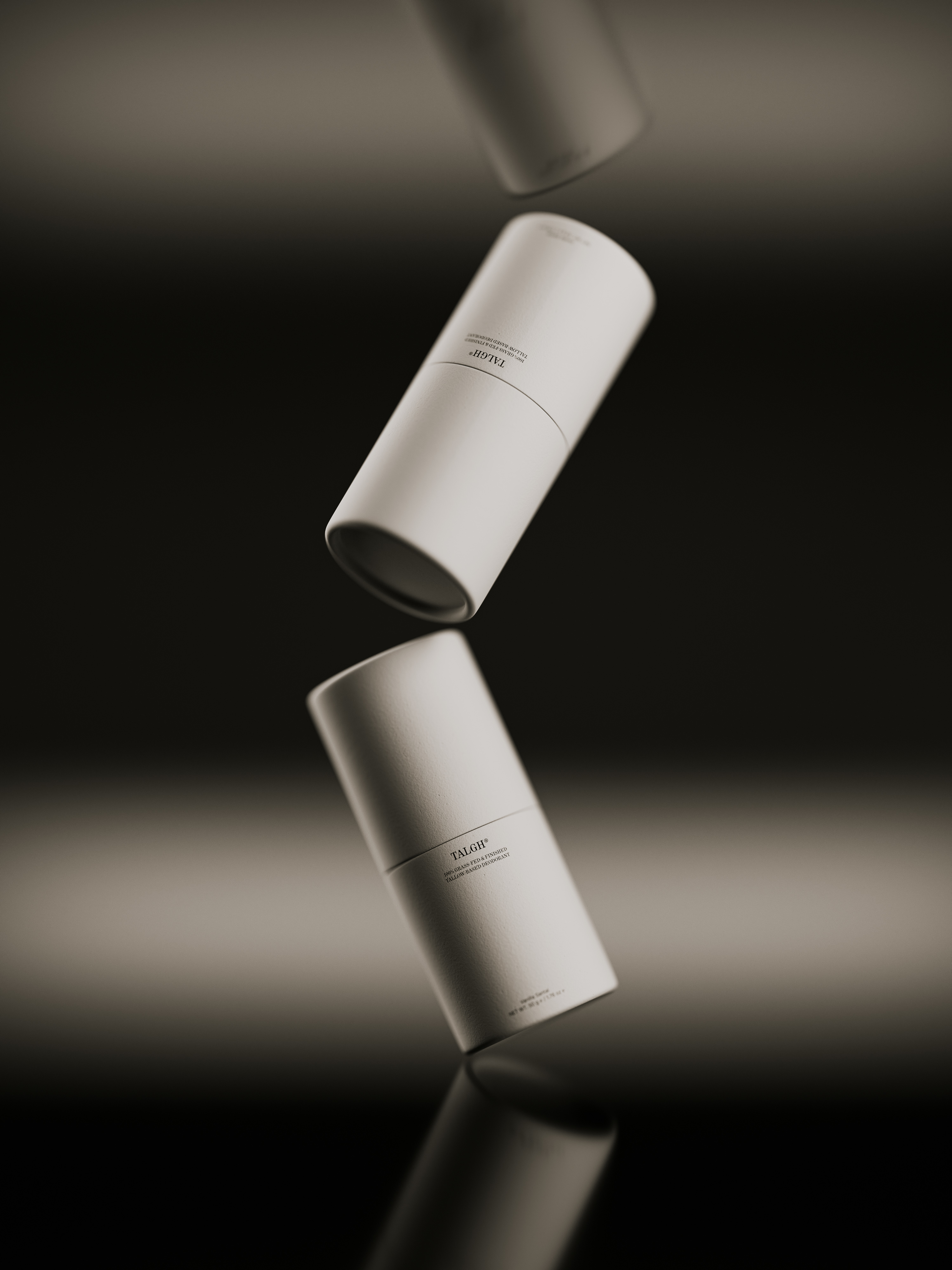 Three white cylindrical containers with product text hover against a dark background with a horizontal light reflection, product shot.
