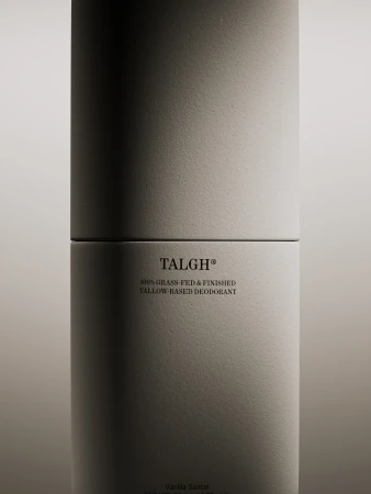 Close-up of a deodorant container by TALGH®, a 100% grass-fed & finished tallow-based product. Minimalist studio shot with soft lighting.
