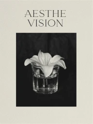 Black and white photo of a lily flower in a faceted glass of water framed with serif text reading Aesthe Vision on cream background.