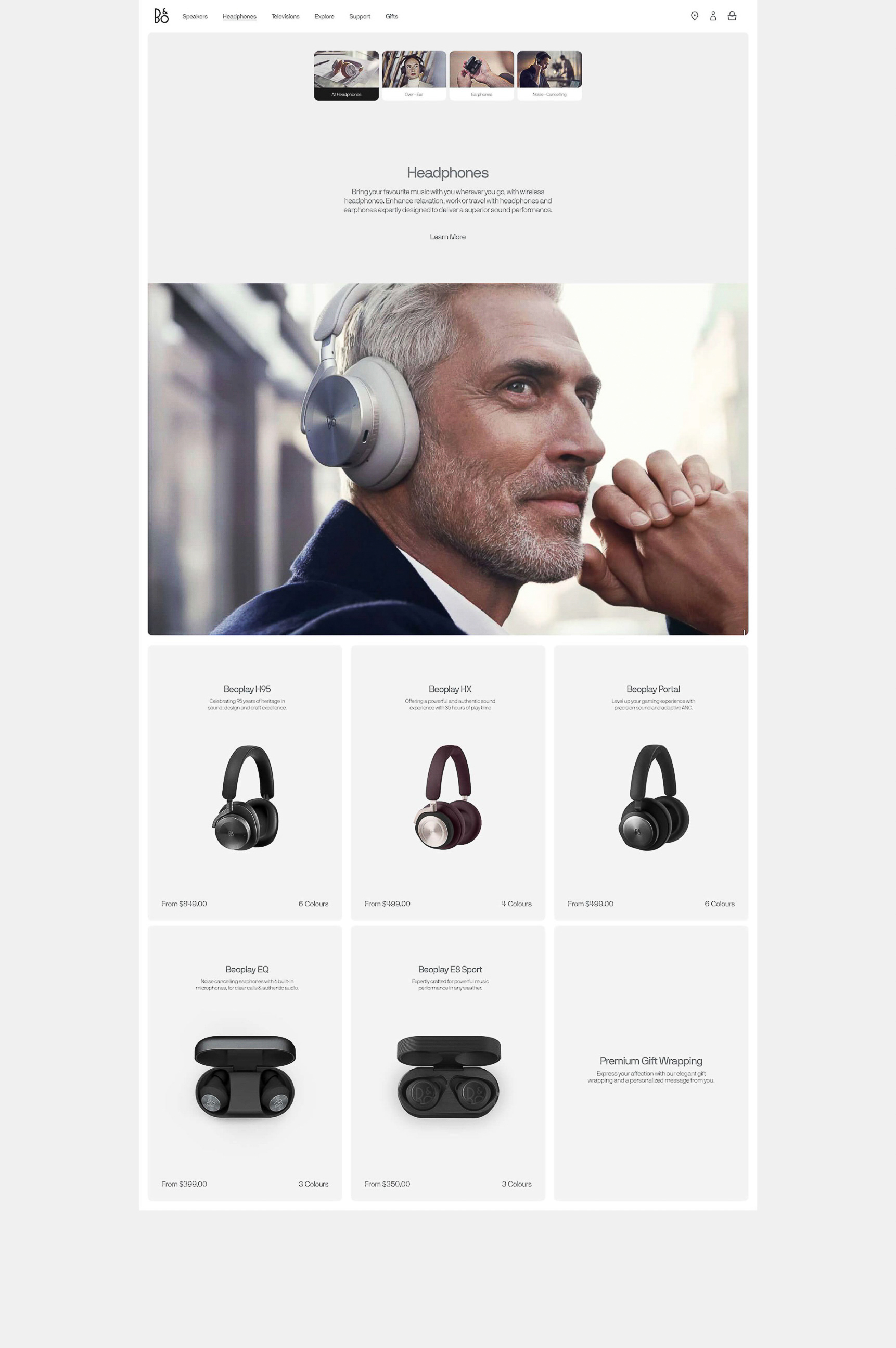Website featuring headphones with a man wearing them on the product page, showcasing various headphone models and designs.