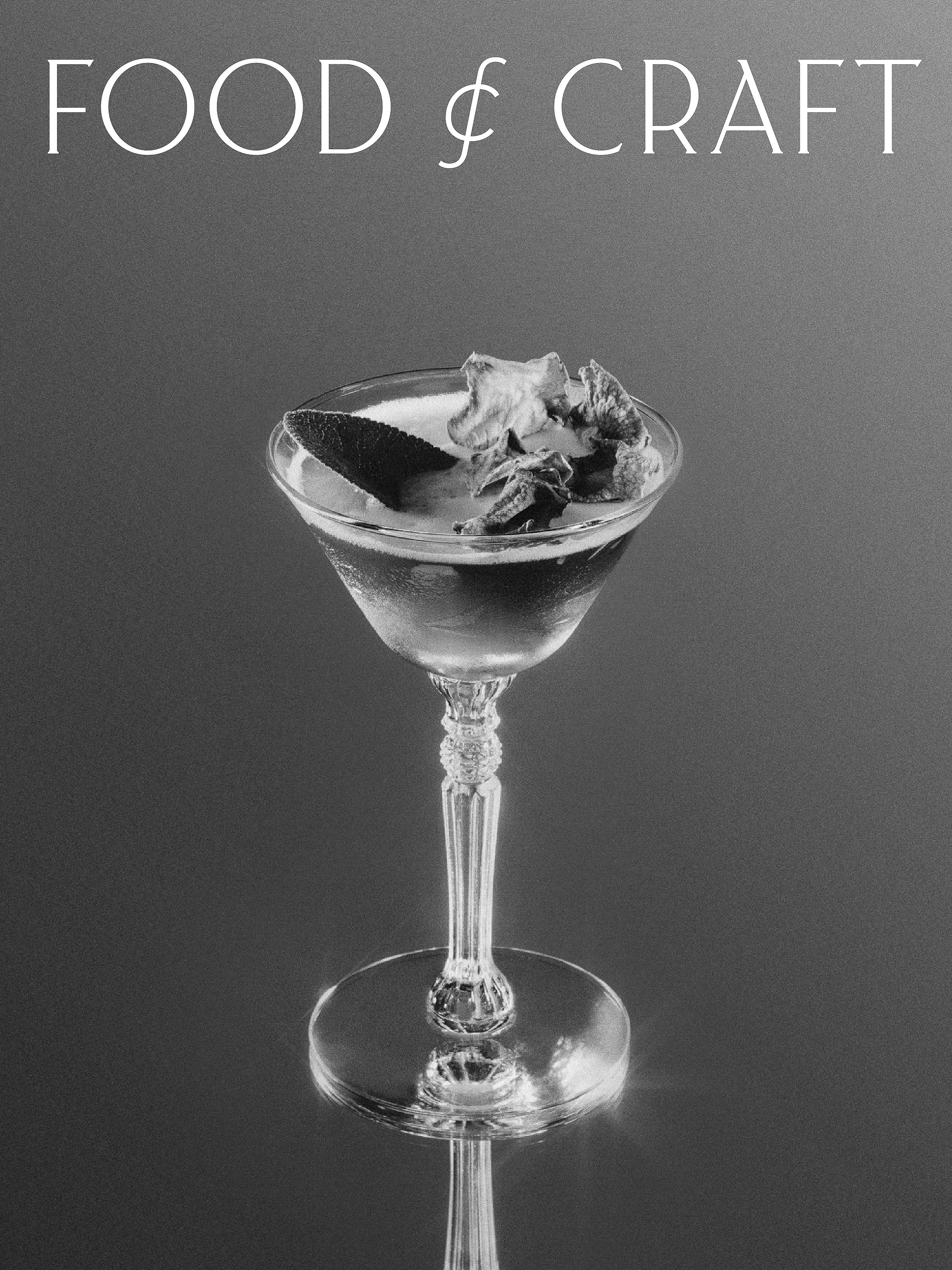 Craft cocktail in a coupe glass, garnished with herbs, on a reflective surface with the text 'Food & Craft' above.