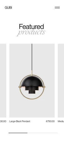 Gubi designer black pendant lamp with gold accents on a gray background with featured products text above.