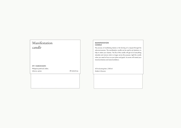 Two product labels for Manifestation Candle, including ingredients and product descriptions, shown on a white surface.