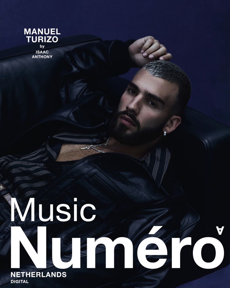 Manuel Turizo lounges in a black leather jacket on a black leather couch, captured for the magazine cover 'Numero Netherlands Digital'.