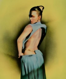 Sydney Sweeney wearing a backless blue gown against a golden gradient background in a portrait by Elizaveta Porodina for WSJ.