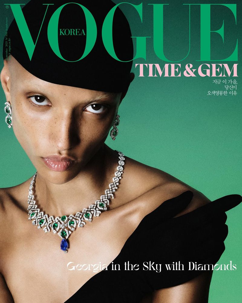 Vogue Korea cover featuring a model with jewelry, wearing a black hat and gloves against a green background. Magazine cover.