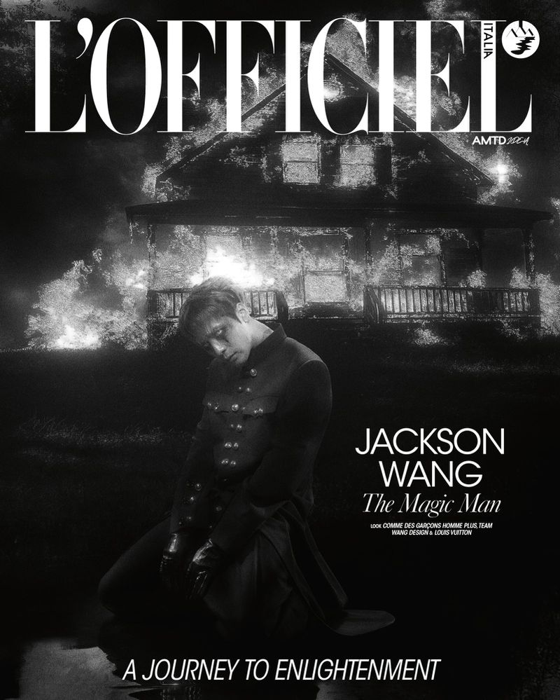 Fashion magazine cover featuring a man in dark clothing kneeling outside a spooky-looking house at night, moody black and white.