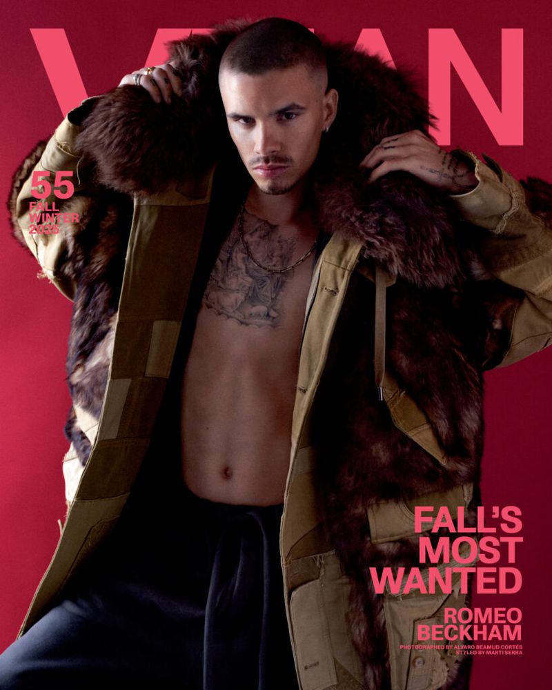 Fashion magazine cover featuring Romeo Beckham in a stylish fur-collared coat against a red background, promoting fall fashion trends.