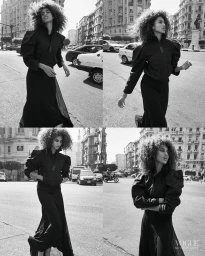 Four-panel black and white sequence of model Imaan Hammam wearing a puff-shoulder black outfit on a bustling city street.
