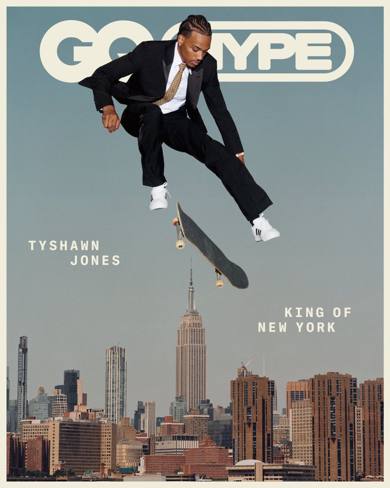 Magazine cover featuring Tyshawn Jones in a black suit jumping with a skateboard over a cityscape, promoting the GQ Type publication.