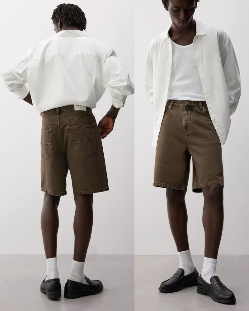Two views of a man modeling khaki shorts and a white button-down shirt, paired with white socks and black loafers, against a white backdrop.