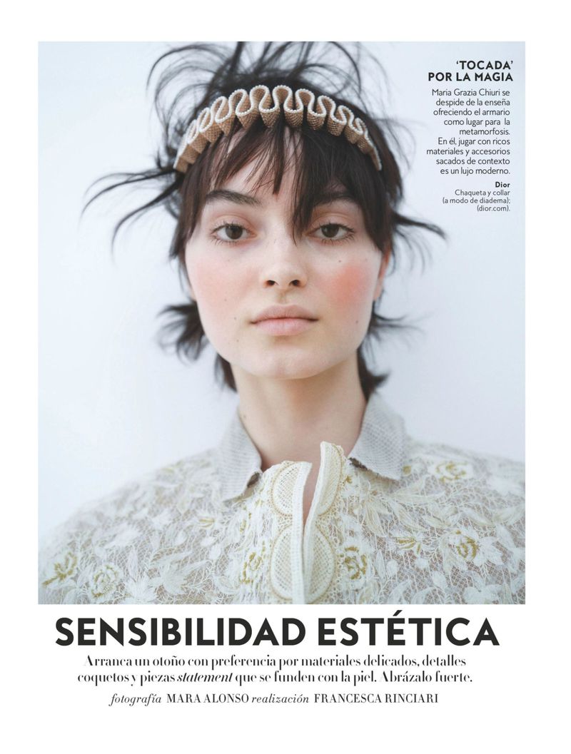 Model Greta Hajwos wearing a ruffled headband and embroidered cream lace top in an editorial portrait for InStyle Spain.