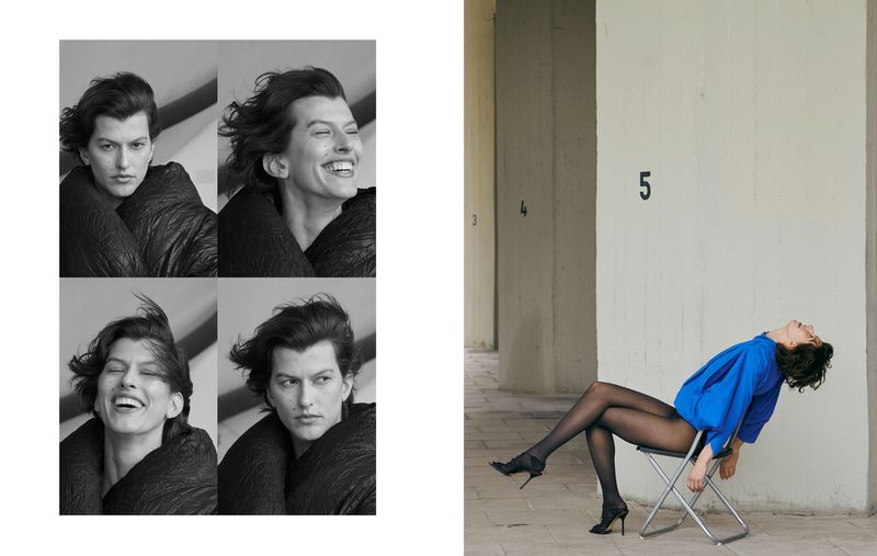 A woman poses in a blue shirt and tights in front of a concrete wall and on the left side, a collage of the woman's portrait.