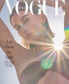 Vogue Australia cover featuring a young woman looking at the camera with bright sunlight flare and the text "Let there be light."