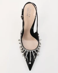 Top-down view of a black patent Gucci slingback pointed-toe pump with dangling crystal fringe on a white background.