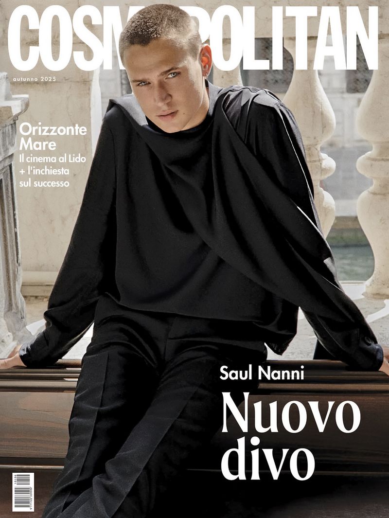 Cosmopolitan magazine cover featuring Saul Nanni in black attire against a balustrade, showcasing modern fashion editorial design.