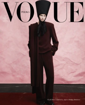 Vogue Polska cover featuring a woman in a dark brown outfit and a large hat against a light pink backdrop, fashion editorial photography.
