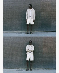 Two split frames of a Black male model wearing a light beige jacket, white shorts, and sunglasses standing against a dark tiled wall.