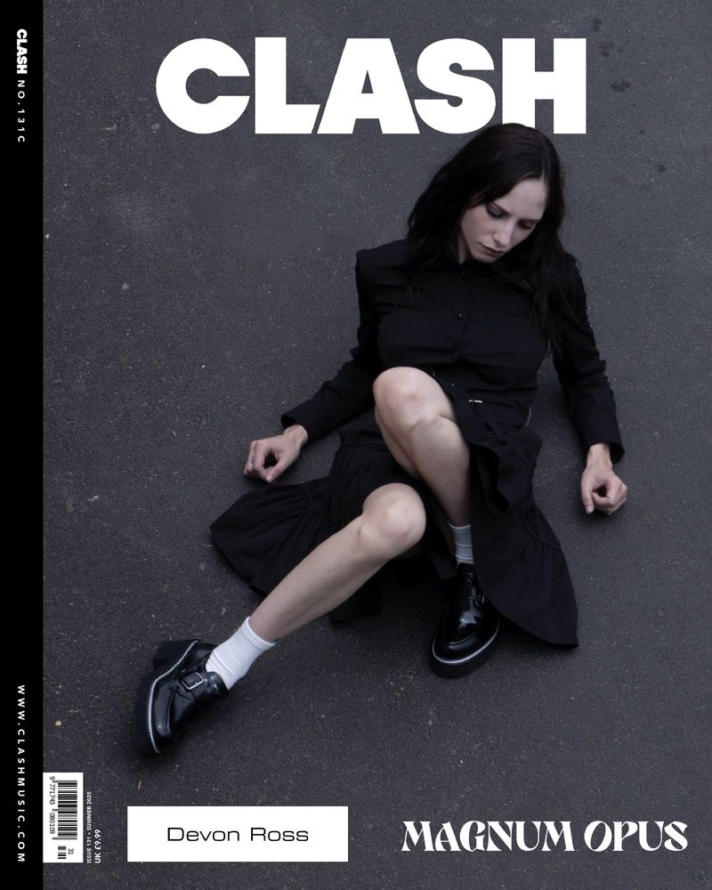 Clash magazine cover featuring a young adult woman in a black dress and glossy shoes, set against a dark gray urban background.