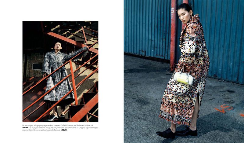 Two models pose outdoors in patterned coats. One stands on the street with a purse. The other is on a red staircase.
